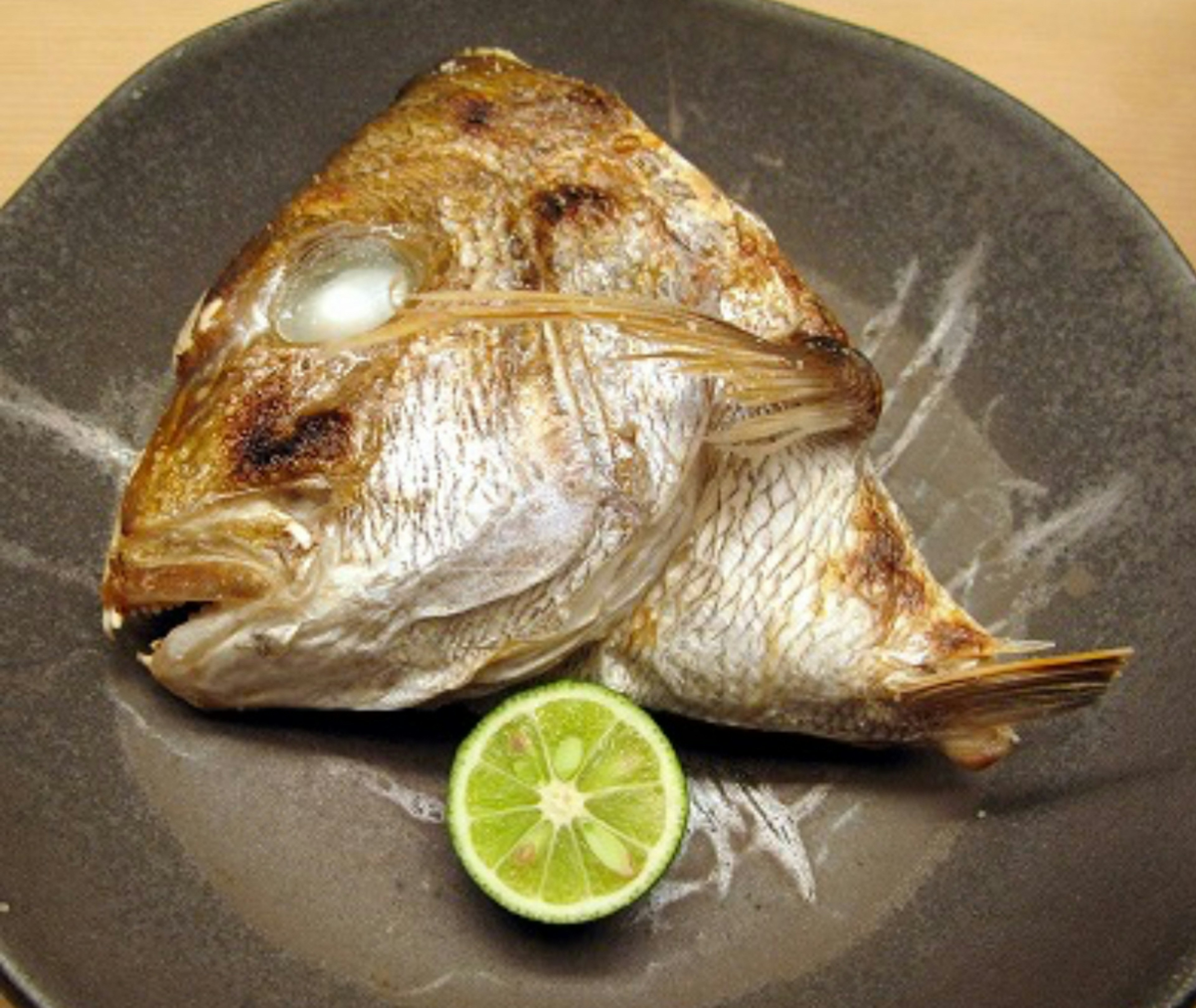 Grilled sea bream head